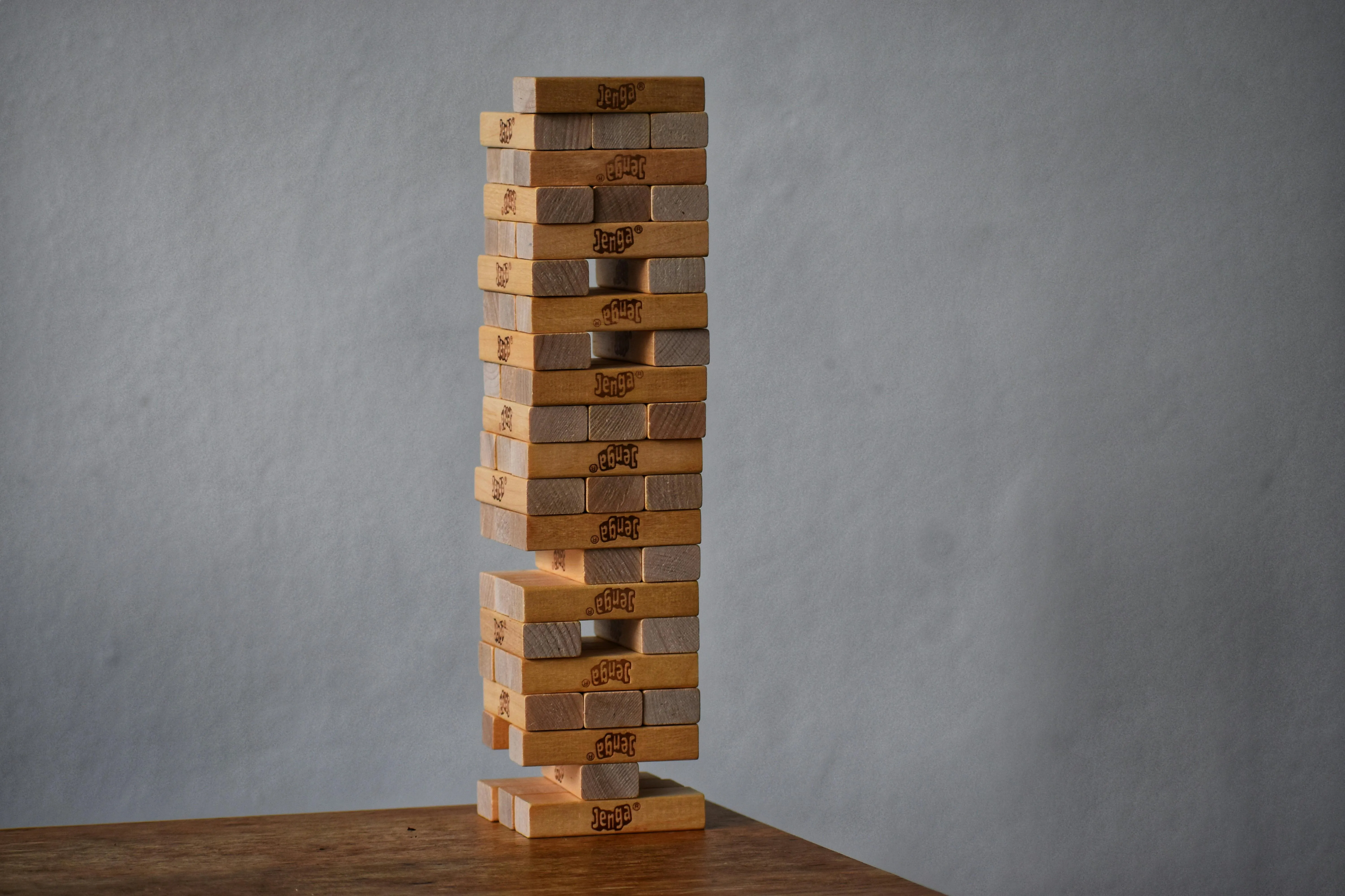 A neatly stacked column of Jenga blocks representing careful planning