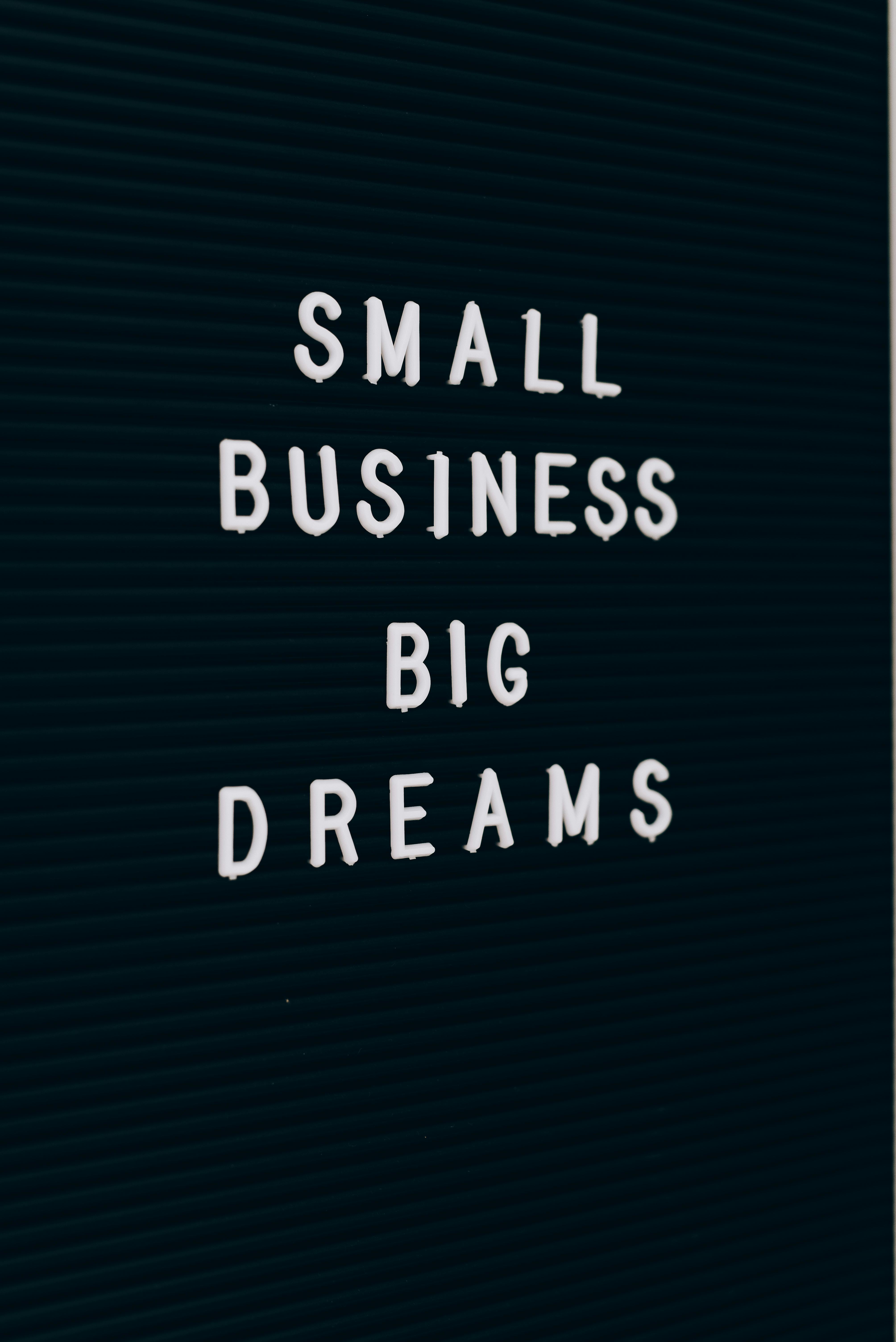 A sign reads small business big dreams