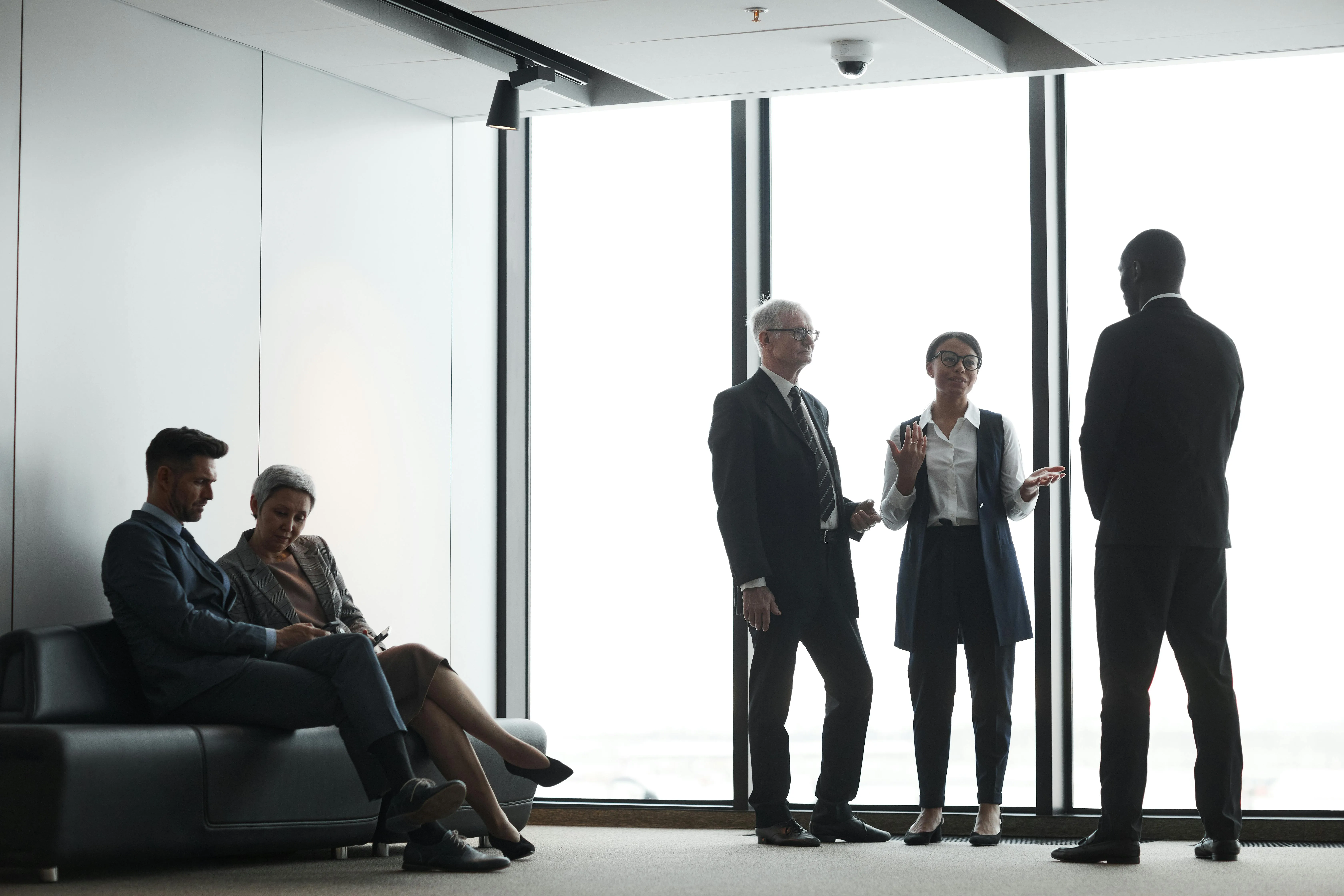 People in a business meeting together in the lobby